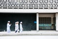 Masjid Negara mosque and muslim people in Kuala Lumpur, Malaysia