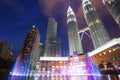 Night view of Petronas Twin Towers KLCC and Symphony Lake  the most attractive place in Malaysia. Royalty Free Stock Photo