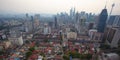 Top view of misty Kuala Lumpur city skyline with Petronas twin towers shot in the morning at sunrise Royalty Free Stock Photo