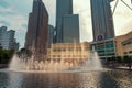 Evening view of fountains near Petronas twin towers in KLCC park Royalty Free Stock Photo