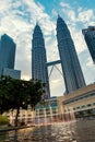 Evening view of fountains near Petronas twin towers in KLCC park Royalty Free Stock Photo