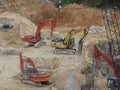 Heavy construction machines doing building foundation works at the construction site. Royalty Free Stock Photo