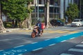 Local man on motorbike driving on central roads of the city