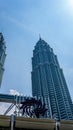 Low angle of KLCC or Petronas Twin Towers with the Suria KLCC logo