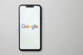 Kuala Lumpur, Malaysia - July 23, 2019: Smartphone showing Google logo on white background