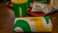 Subway sandwich in a packaging with soft drink in a plastic cup on a table Royalty Free Stock Photo