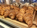 Various types of breads are displayed for sale inside the bakery display rack. Royalty Free Stock Photo