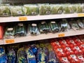 Vegetables packed inside a plastic container and plastic wrap.