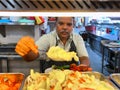 KUALA LUMPUR, MALAYSIA-JUN 13 2023:Workers prepares 'nasi kandar' or 'kandar rice' in Kuala Lumpur