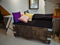 Big cargo wooden crate upcycled into a sofa to match the industrial interior design in an Royalty Free Stock Photo