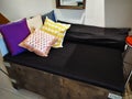 Big cargo wooden crate upcycled into a sofa to match the industrial interior design in an