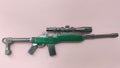 A miniature model of military sniper automatic gun in small-scale