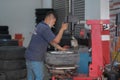 Tyre change on the car in a workshop by a mechanic Royalty Free Stock Photo