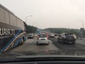 Traffic jams on Malaysian highways during peak hours.