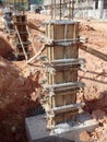 Column timber form work and reinforcement bar at the construction site.