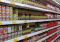 Processed can food are arranged on a supermarket shelf