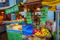 Kuala Lumpur, Malaysia - March 9, 2017: Unnown vendor in fresh juice and fruit market stand in the downtown. Royalty Free Stock Photo