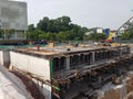 Building substructure and super-structure under construction using the open-cut method.