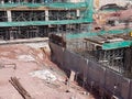 Building substructure and super-structure under construction using the open-cut method.