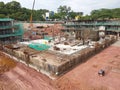 Building substructure and super-structure under construction using the open-cut method.