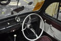 Classic car driver steering and interior dashboard.