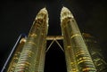 KUALA LUMPUR / MALAYSIA - 2019 : Night view of the impressive Petronas twin towers and bridge at Kuala Lumpur KLCC area Royalty Free Stock Photo