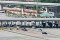 High angle daytime traffic view in the Sungai Besi tolls, Malaysia.