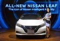 Model posed with Nissan Leaf produced by Nissan Motor Co., Ltd. during Kuala Lumpur