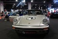 Porsche cars exhibit for sale in the huge showroom. Royalty Free Stock Photo