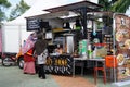 Street hawkers using food trucks to serve their business to the customer.