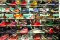 Shelves of colorful shoes and footwear at a shoestore in the Pavilion Mall in Bukit Bintang Royalty Free Stock Photo