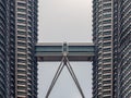 Kuala Lumpur, Malaysia : Petronas Twin Towers with bridge, modern architecture and capital city panorama tourist destination