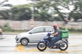 KUALA LUMPUR, MALAYSIA, September 17, 2019: Grabfood ordered online being delivered on motorbike by grab rider. Grabfood is a