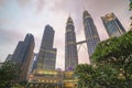 Sunset at Kuala Lumpur city skyline with Petronas KLCC Twin Towers Royalty Free Stock Photo