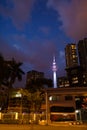 Kuala Lumpur, Malaysia - 13th February, 2018: Kuala Lumpur night streets city landscape and Menara KL tower view Royalty Free Stock Photo