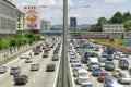 Kuala Lumpur, Malaysia - 13th February, 2018: train arrive in LRT station somewhere in Kuala Lumpur modern city traffic jam in Royalty Free Stock Photo