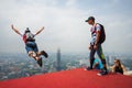 A BASE jumpers in jumps off from KL Tower.