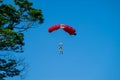 A BASE jumpers in jumps off from KL Tower.