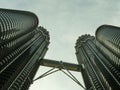 KUALA LUMPUR / MALAYSIA - 2019 : View of the impressive Petronas twin towers and bridge at Kuala Lumpur KLCC area