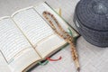 KUALA LUMPUR, 18 May 2016: The Holy Quran,Tasbih and kopiah hat. DOF and copy space