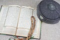 KUALA LUMPUR, 18 May 2016: The Holy Quran,Tasbih and kopiah hat. DOF and copy space