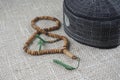 KUALA LUMPUR, 18 May 2016: The Holy Quran,Tasbih and kopiah hat. DOF and copy space