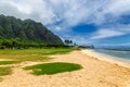 Kualoa beach park and mountain range on Oahu island