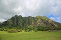 Kualoa Ranch cliffs under clouds Royalty Free Stock Photo