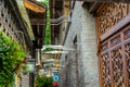 Kuan Zhai Alley or Wide and Narrow Alley ancient street in Chengdu during afternoon at Chengdu Sichuan , China : 13 October 2023