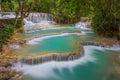 Kuang Si waterfall with blue minerals water Royalty Free Stock Photo