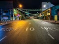 An empty street with colorful street lamp in the late night in Kuantan city