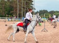 Kuban Cossack on horses performing tricks on the on open-air