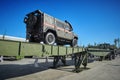 KUBINKA, RUSSIA, AUG.24, 2018: Armored military car on temporary bridge metal construction on heavy truck chassis for military and