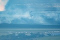 Flight of Italian aerobatic team Frecce Tricolori in close formation on SIAF 2021 airshow Royalty Free Stock Photo